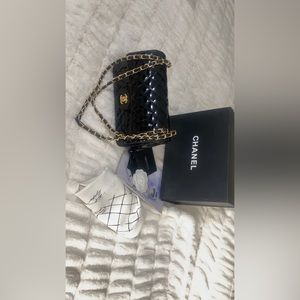 Black shiny leather bag